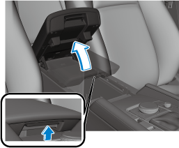 To open the lid, pull the knob, slide the lid rearward, and then lift ...